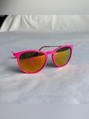 Pink sunglasses with reflective lenses